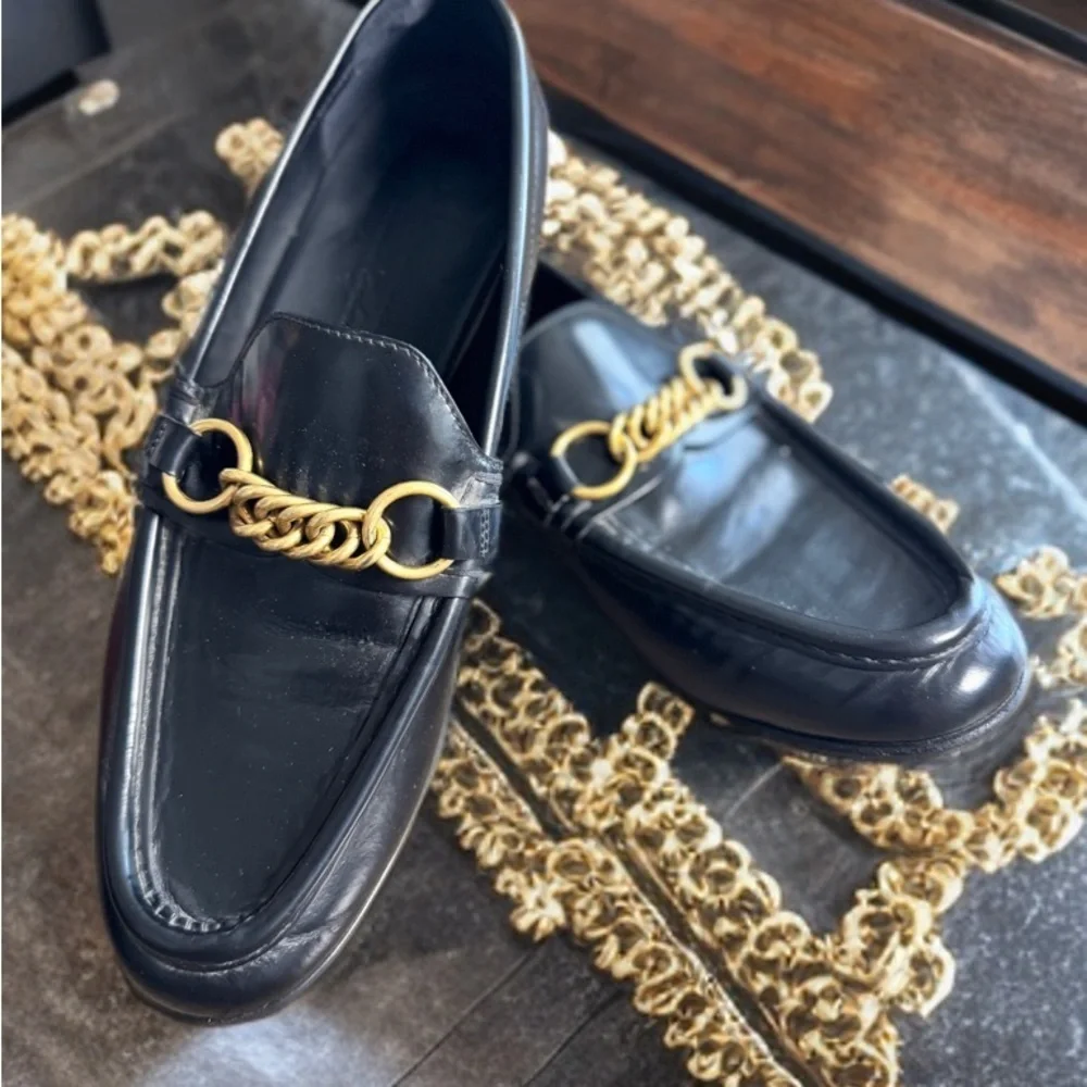 Burberry Black and Gold Slip-On Loafers with Chain Detail